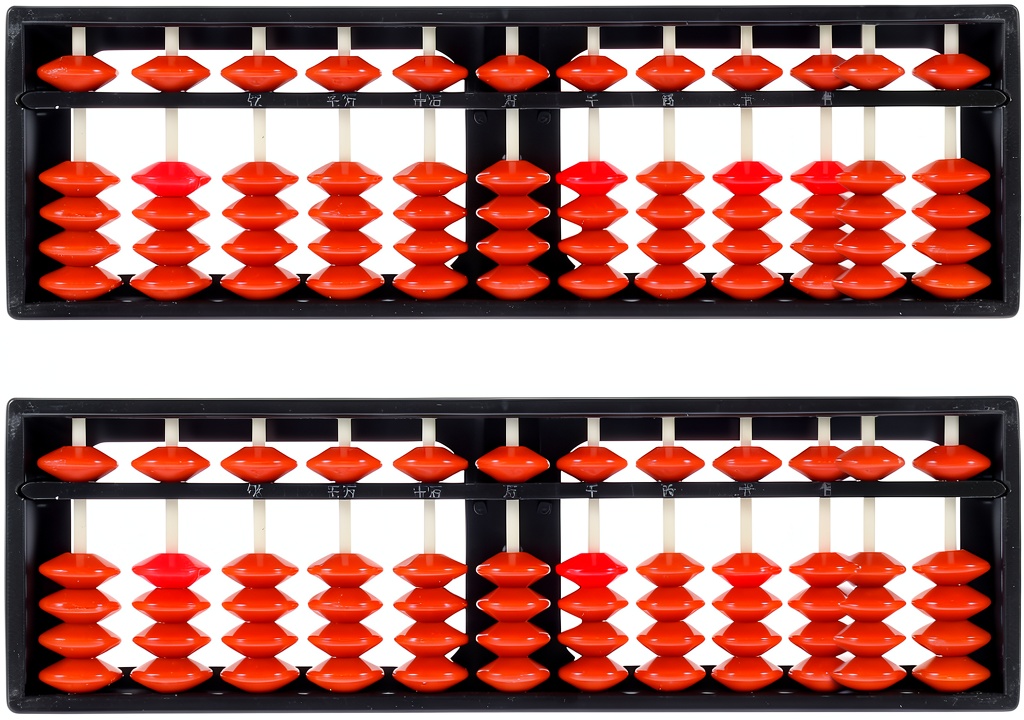 Toddmomy Abacus displayed on a wooden desk with educational materials